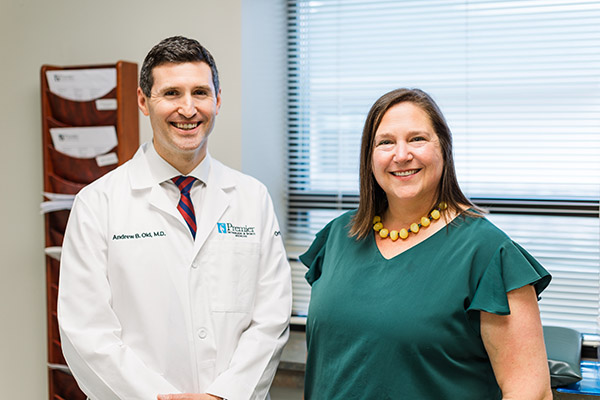 Knee replacement recipient Christy Hofmanner and Chester County Hospital orthopaedic surgeon Andrew Old, MD.